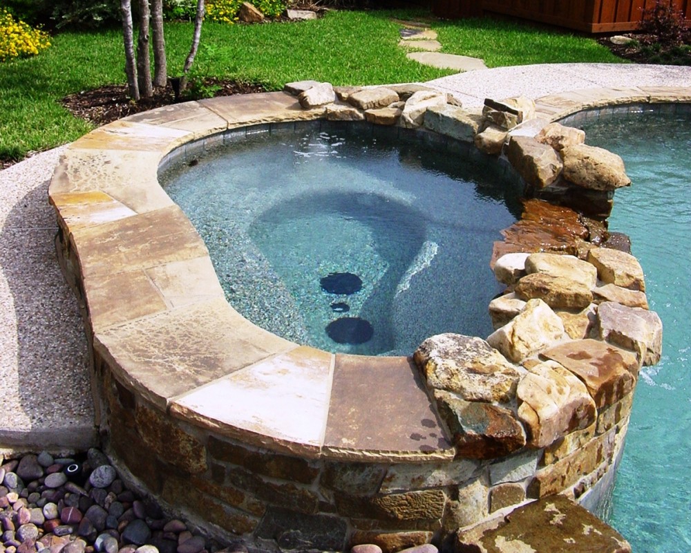 Photo By Gold Medal Pools & Outdoor Living. Spas
