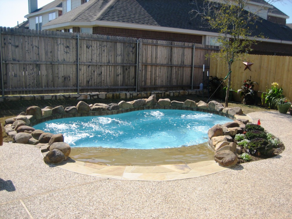 Photo By Gold Medal Pools & Outdoor Living. Spools