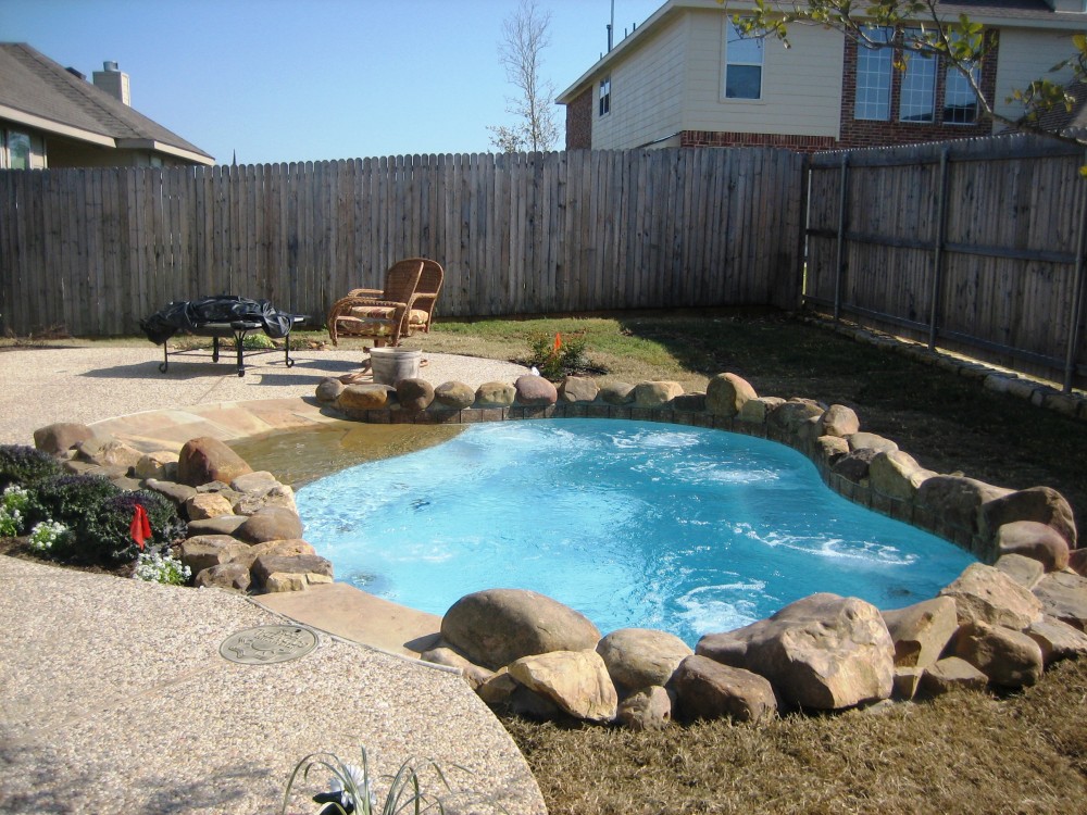 Photo By Gold Medal Pools & Outdoor Living. Spools