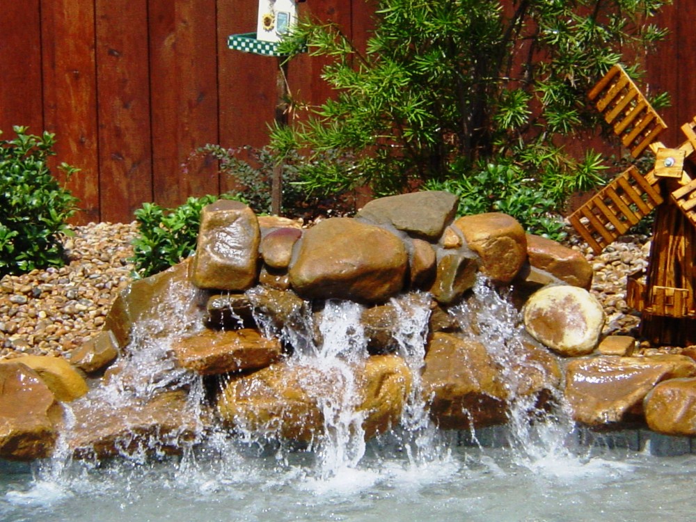 Photo By Gold Medal Pools & Outdoor Living. Water Features