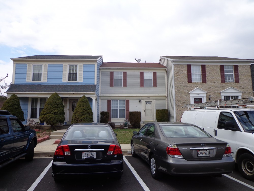 Photo By BRAX Roofing. Town House Roof Replacement 