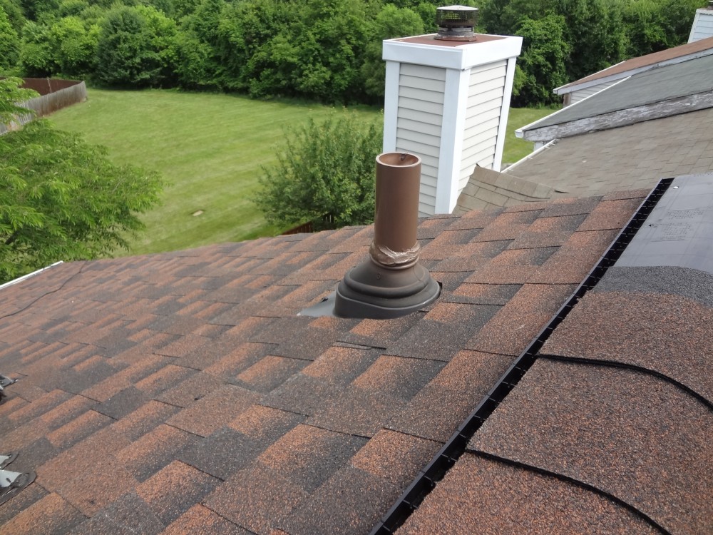 Photo By BRAX Roofing. Town House Roof Replacement 