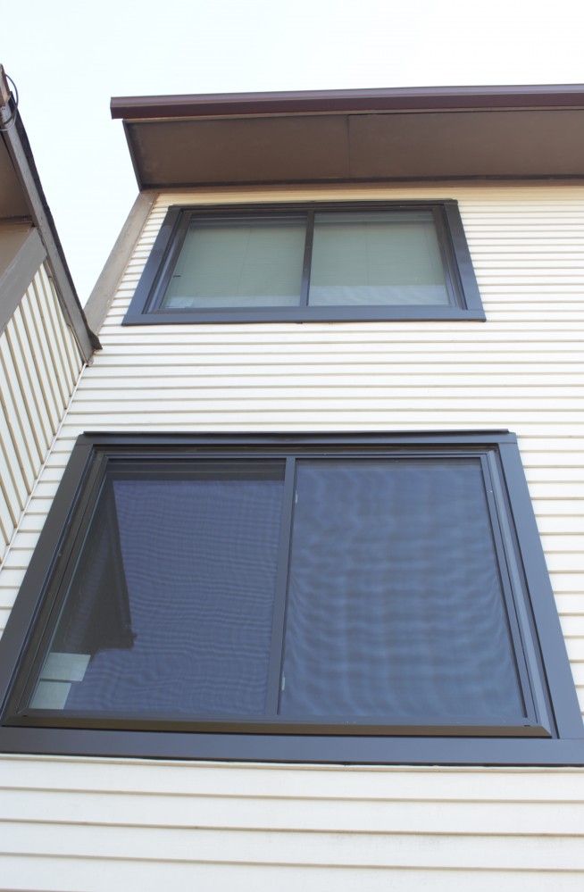 Photo By Custom Concepts Construction. Mezzo Vinyl Windows - Bronze