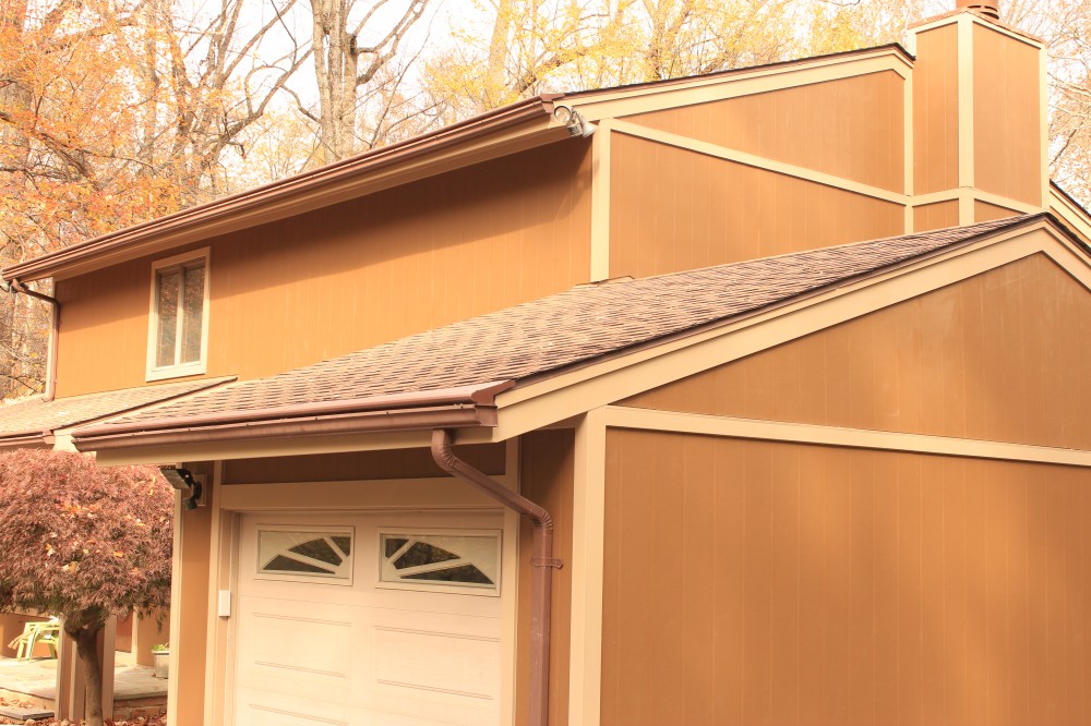 Photo By Custom Concepts Construction. James Hardie Chestnut Brown Lap Siding