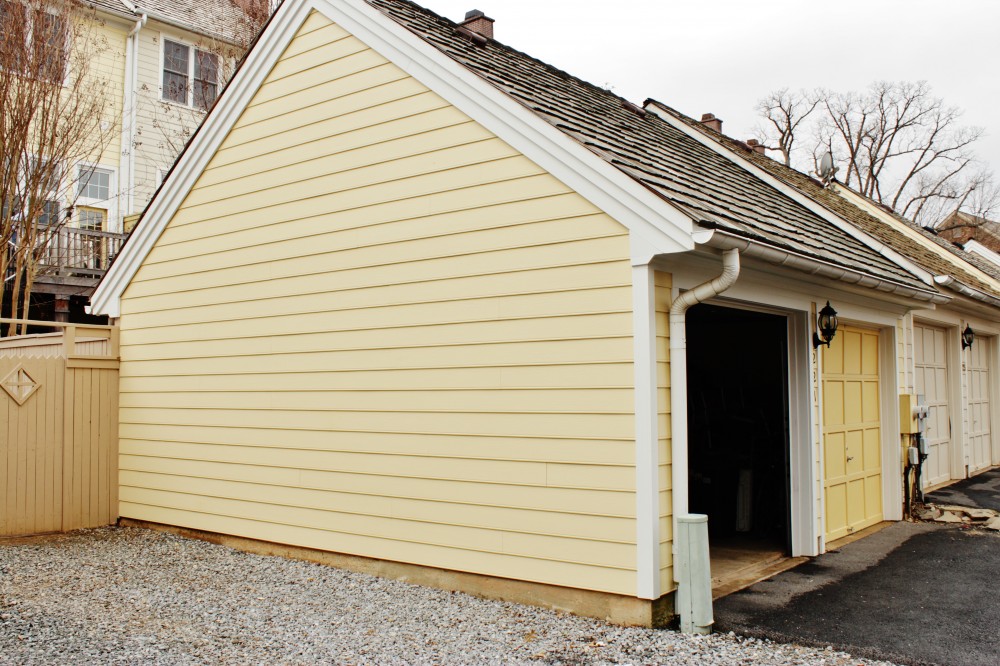 Photo By Custom Concepts Construction. James Hardie Lap Siding | Woodland Cream