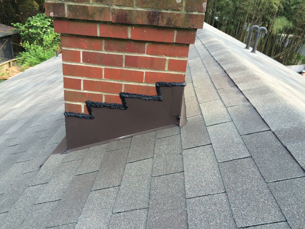 Photo By BRAX Roofing. Roof Replacement 