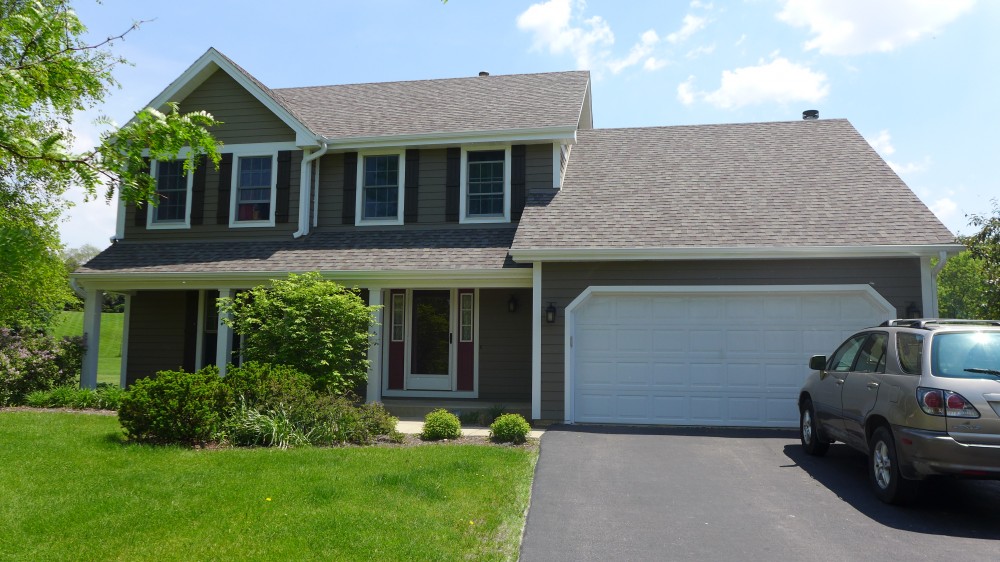 Photo By Erdmann Exterior Designs Ltd.. James Hardie Siding Project: Elgin, IL 