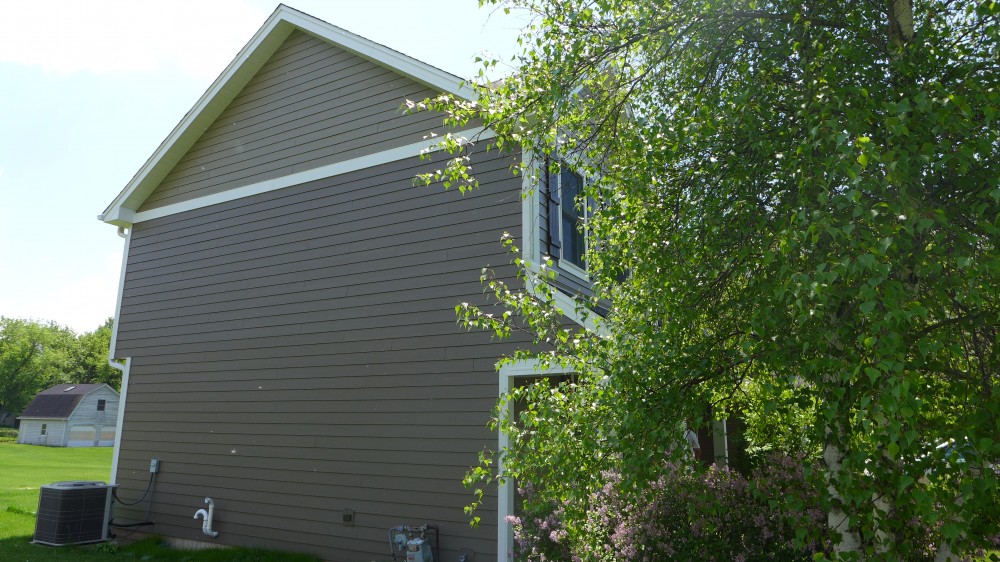 Photo By Erdmann Exterior Designs Ltd.. James Hardie Siding Project: Elgin, IL 