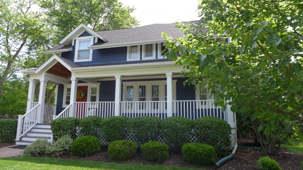 Photo By Erdmann Exterior Designs Ltd.. James Hardie Siding: Park Ridge, IL 