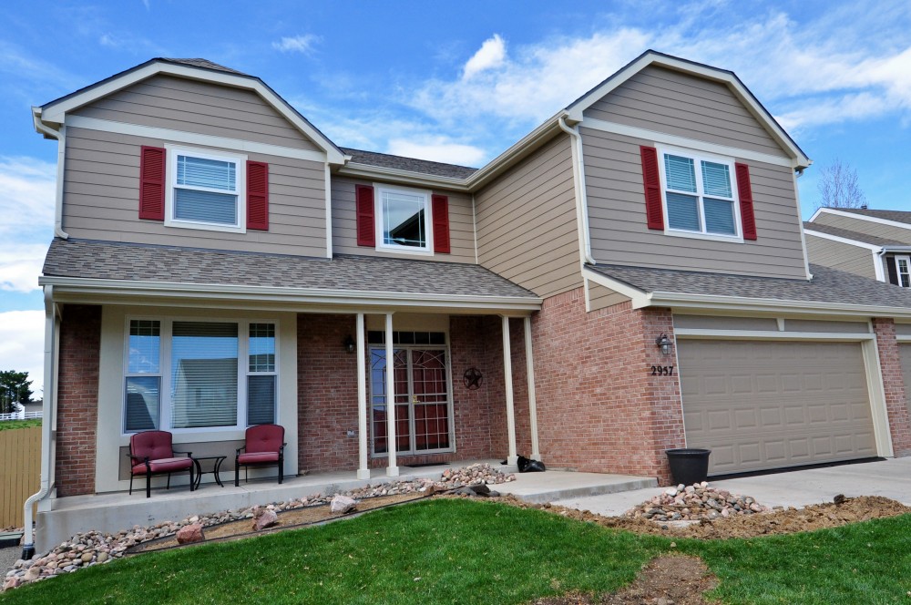 Photo By Northern Lights Exteriors. James Hardie Siding