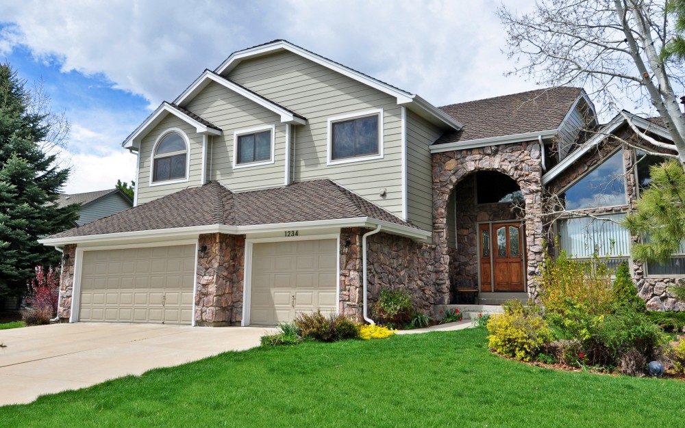 Photo By Northern Lights Exteriors. James Hardie Siding