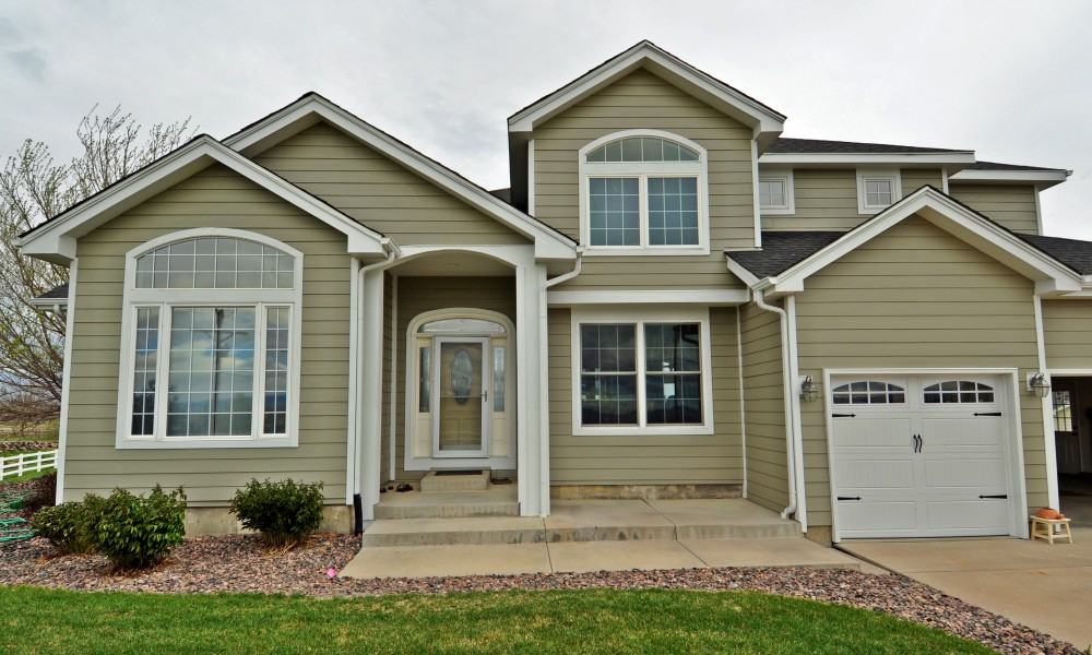 Photo By Northern Lights Exteriors. James Hardie Siding