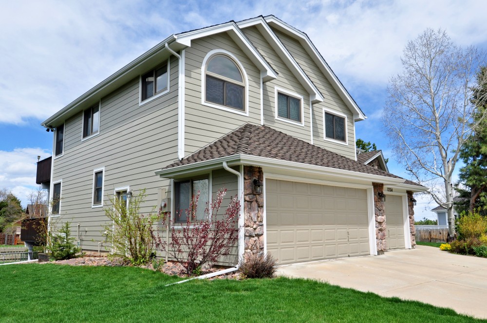 Photo By Northern Lights Exteriors. James Hardie Siding