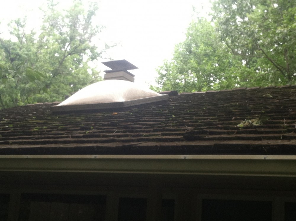 Photo By BRAX Roofing. Skylight Replacement