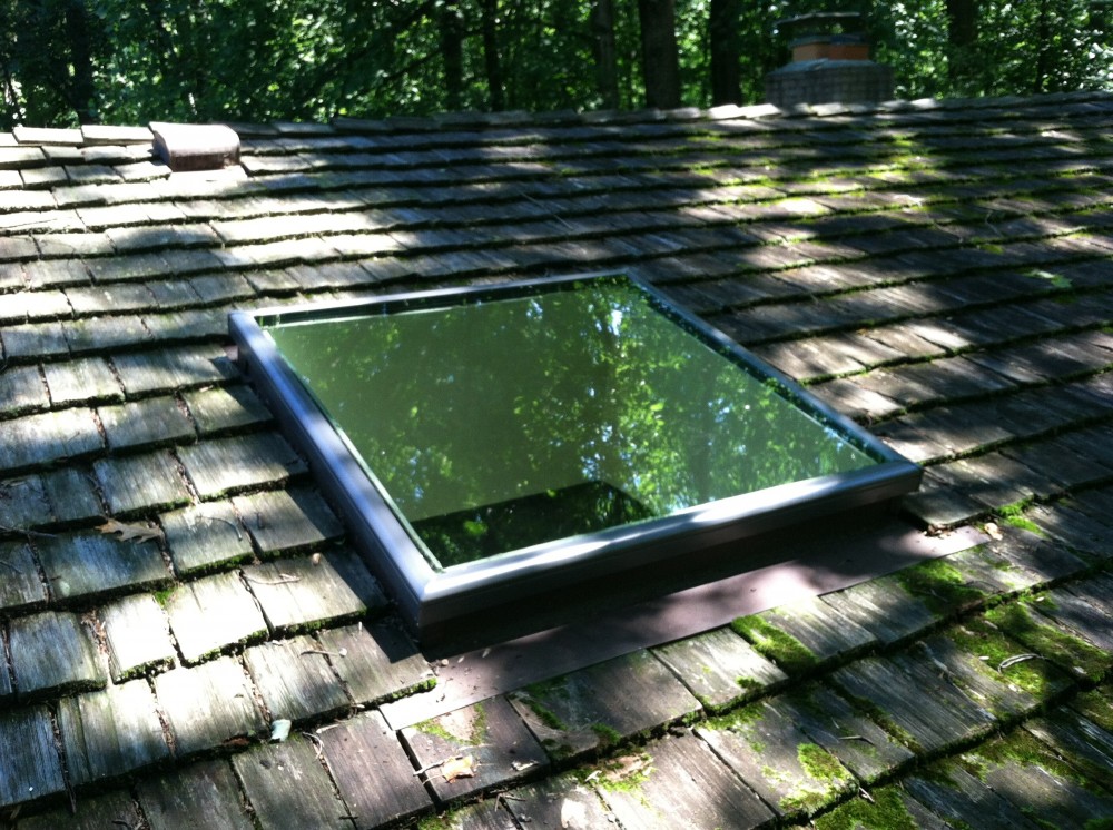 Photo By BRAX Roofing. Skylight Replacement