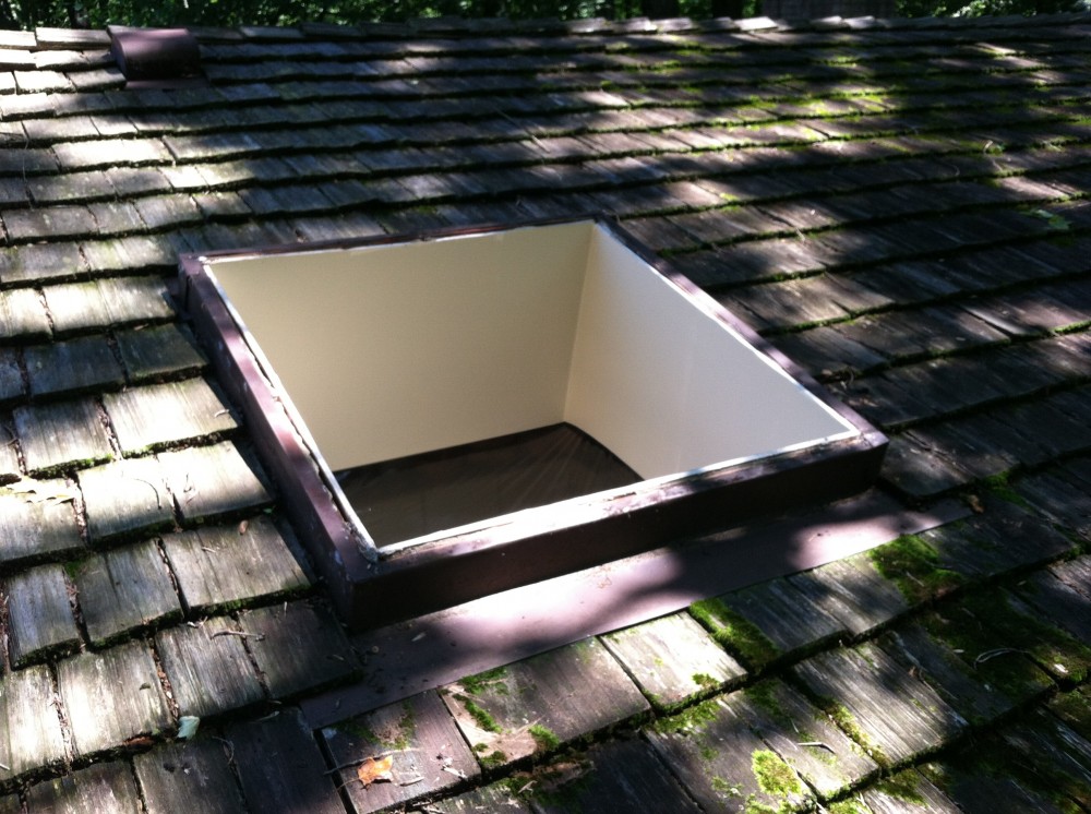 Photo By BRAX Roofing. Skylight Replacement