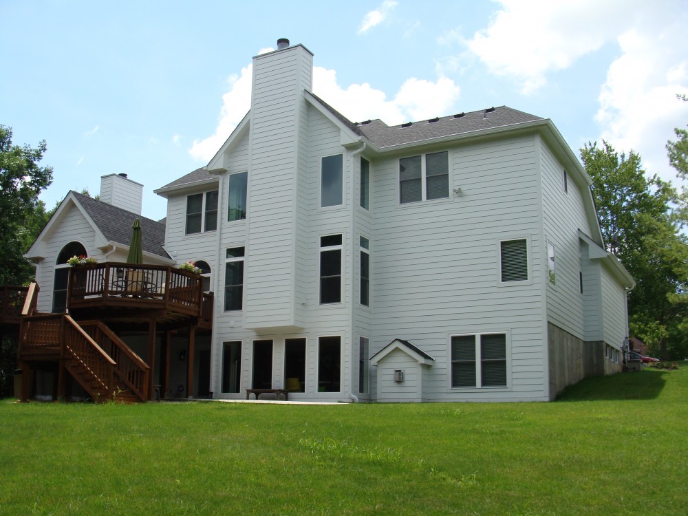 Photo By STL Siding Pros. Arctic White James Hardie Siding