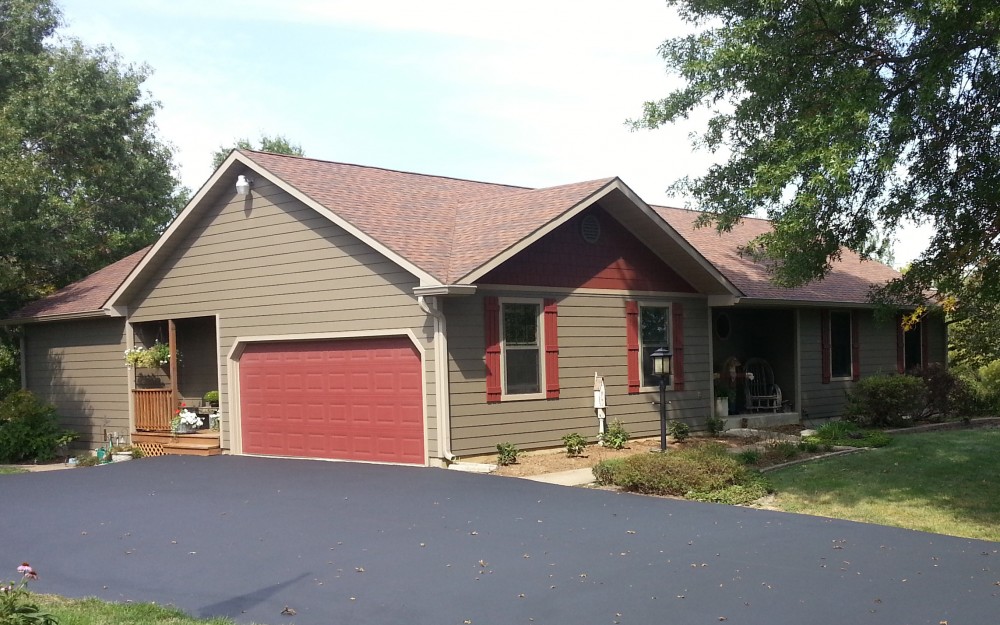 Photo By STL Siding Pros. Timberbark James Hardie Siding