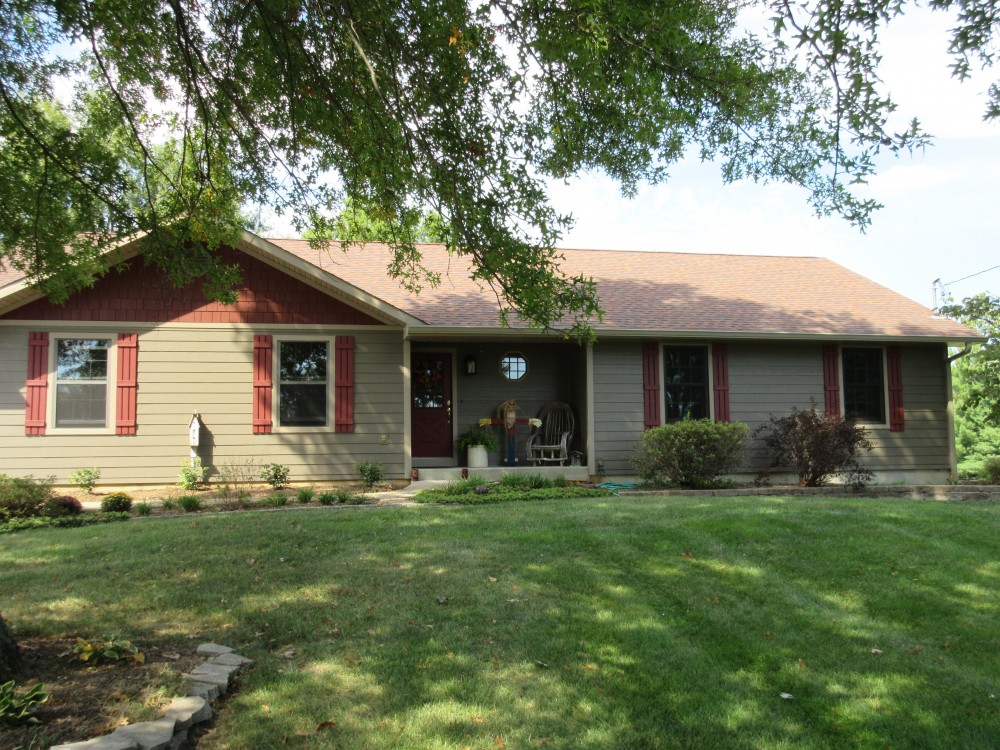 Photo By STL Siding Pros. Timberbark James Hardie Siding