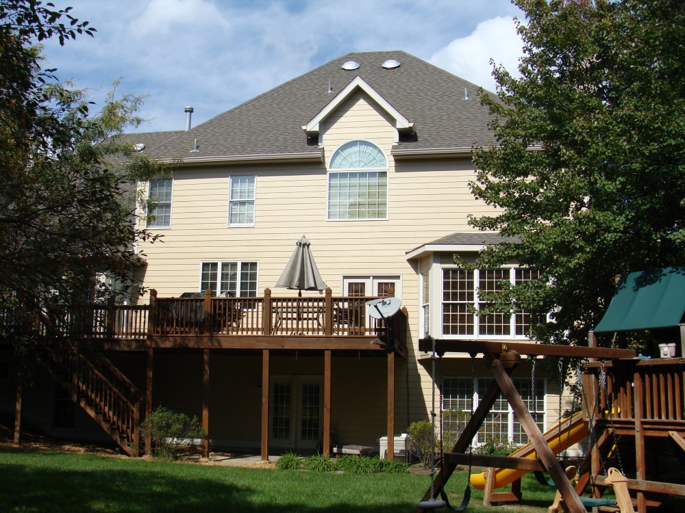 Photo By STL Siding Pros. Autumn Tan James Hardie Siding