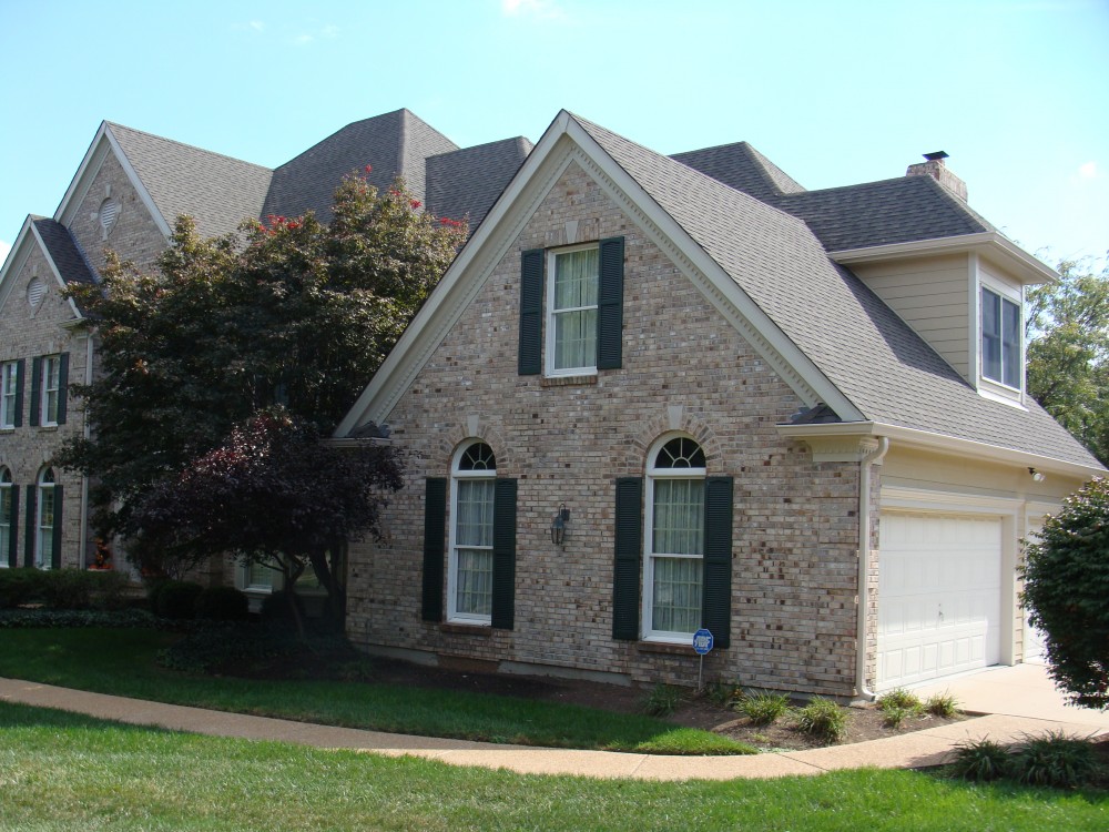 Photo By STL Siding Pros. Autumn Tan James Hardie Siding