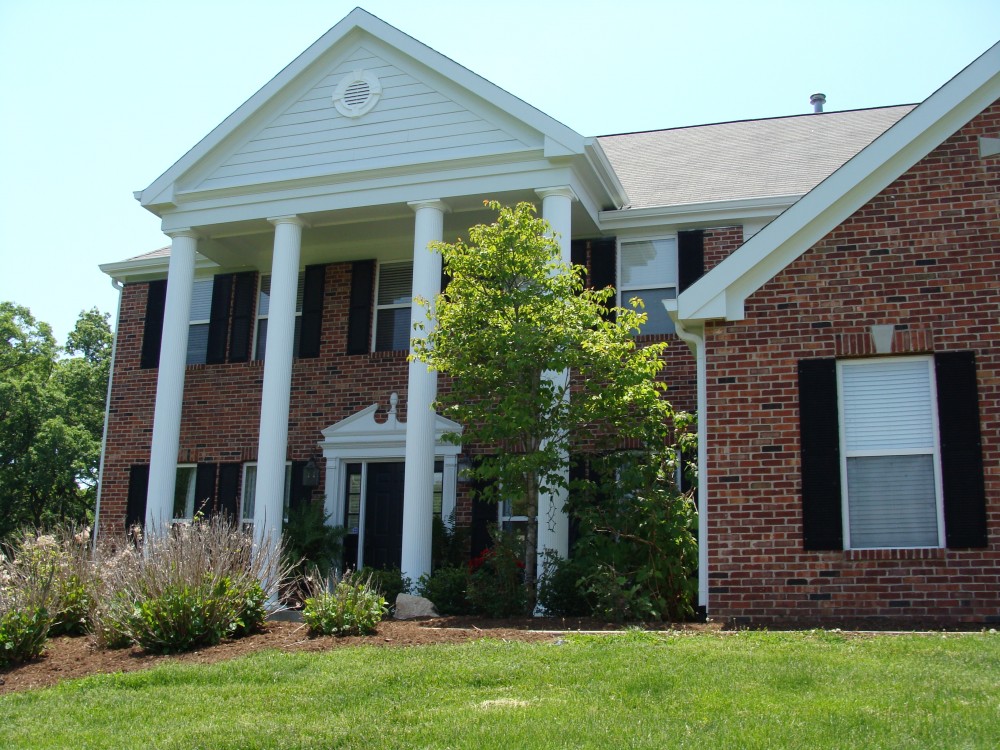 Photo By STL Siding Pros. Arctic White James Hardie Siding