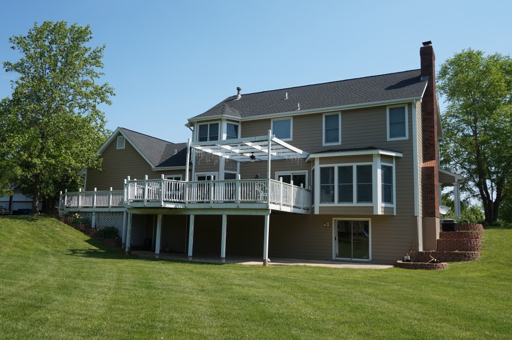 Photo By STL Siding Pros. Khaki Brown James Hardie Siding