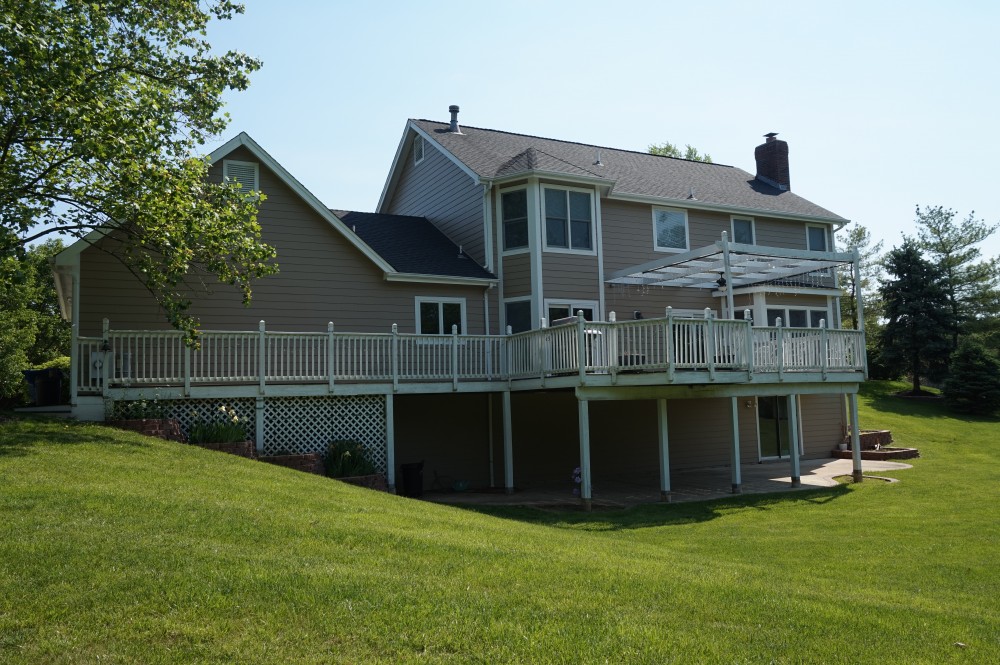 Photo By STL Siding Pros. Khaki Brown James Hardie Siding