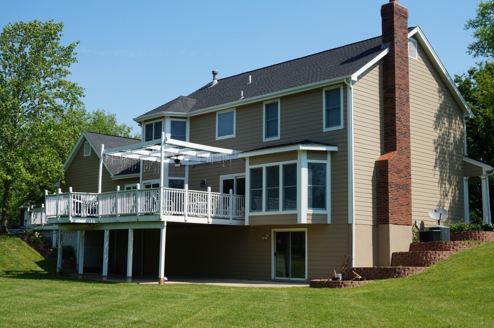 Photo By STL Siding Pros. Khaki Brown James Hardie Siding