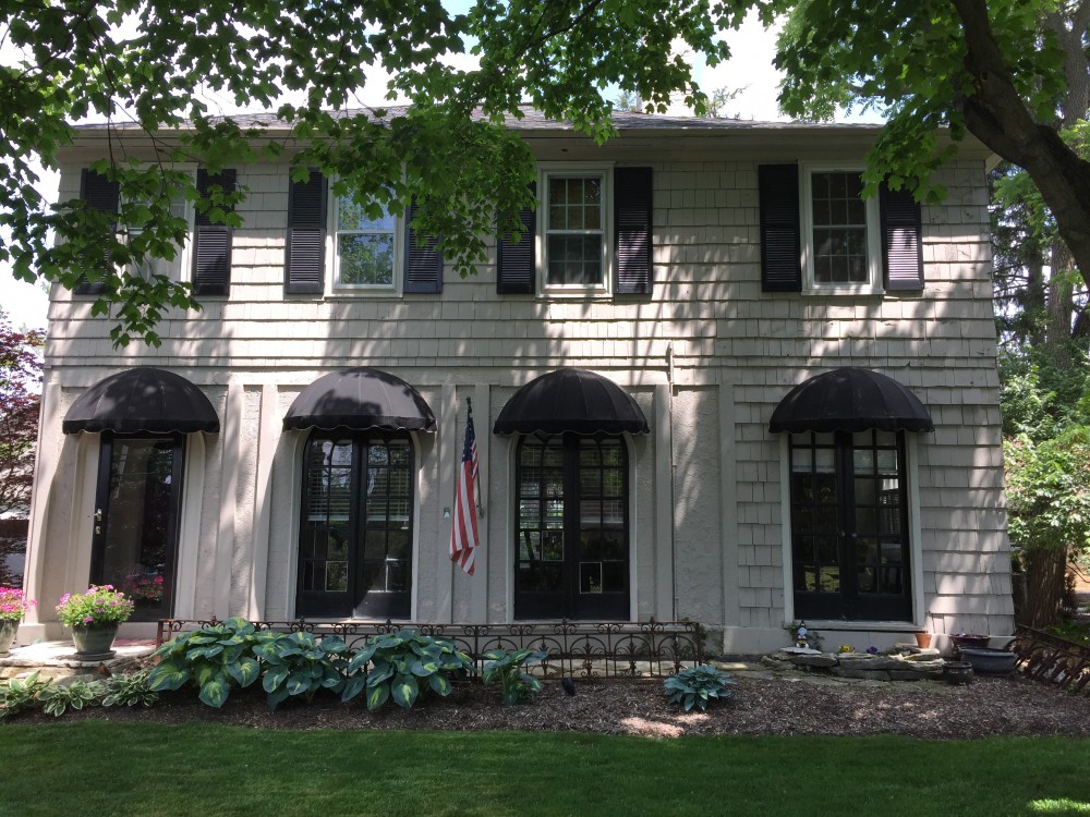 Photo By Ohio Exteriors. Landmark Chestnut Limestone On Lower Half Of Front Elevation