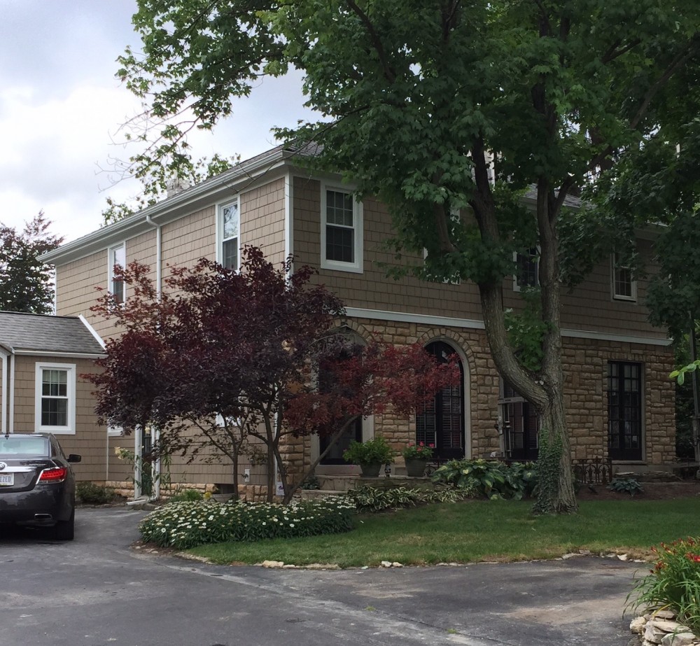 Photo By Ohio Exteriors. Landmark Chestnut Limestone On Lower Half Of Front Elevation