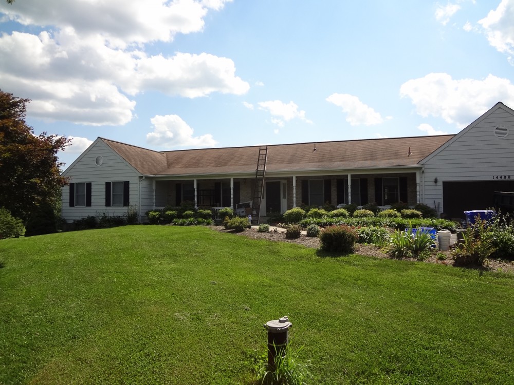 Photo By BRAX Roofing. Chimney Crown.