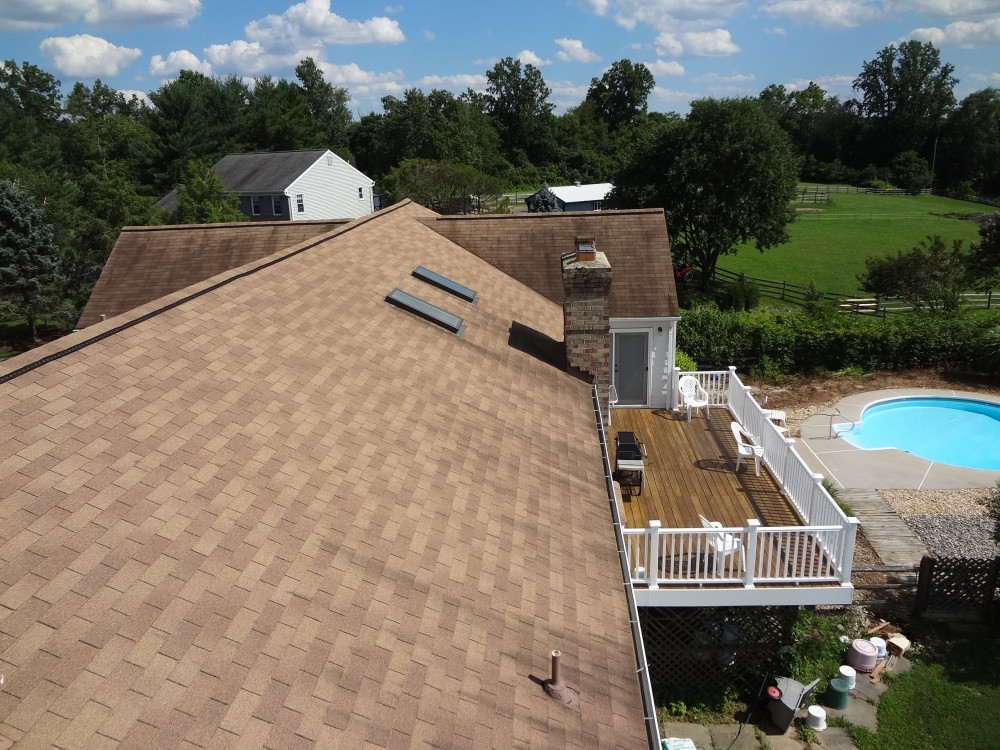 Photo By BRAX Roofing. Chimney Crown.