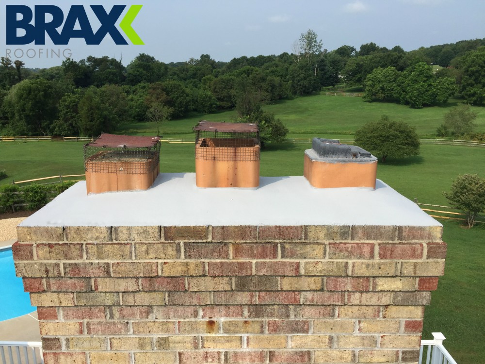 Photo By BRAX Roofing. Chimney Repair 