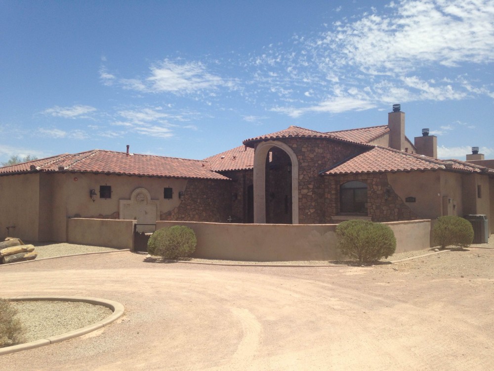 Photo By Tru Builders. Old World Oasis