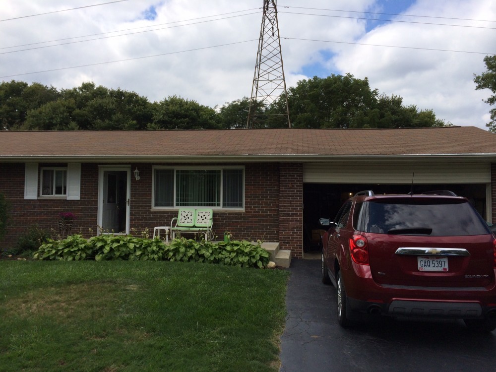 Photo By Ohio Exteriors. Covered Porch With Self-Closing Gates