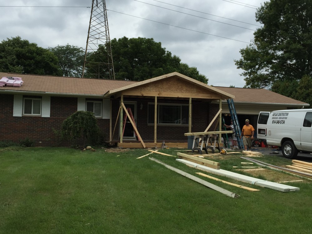 Photo By Ohio Exteriors. Covered Porch With Self-Closing Gates