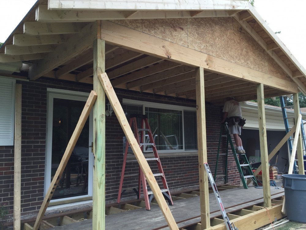 Photo By Ohio Exteriors. Covered Porch With Self-Closing Gates