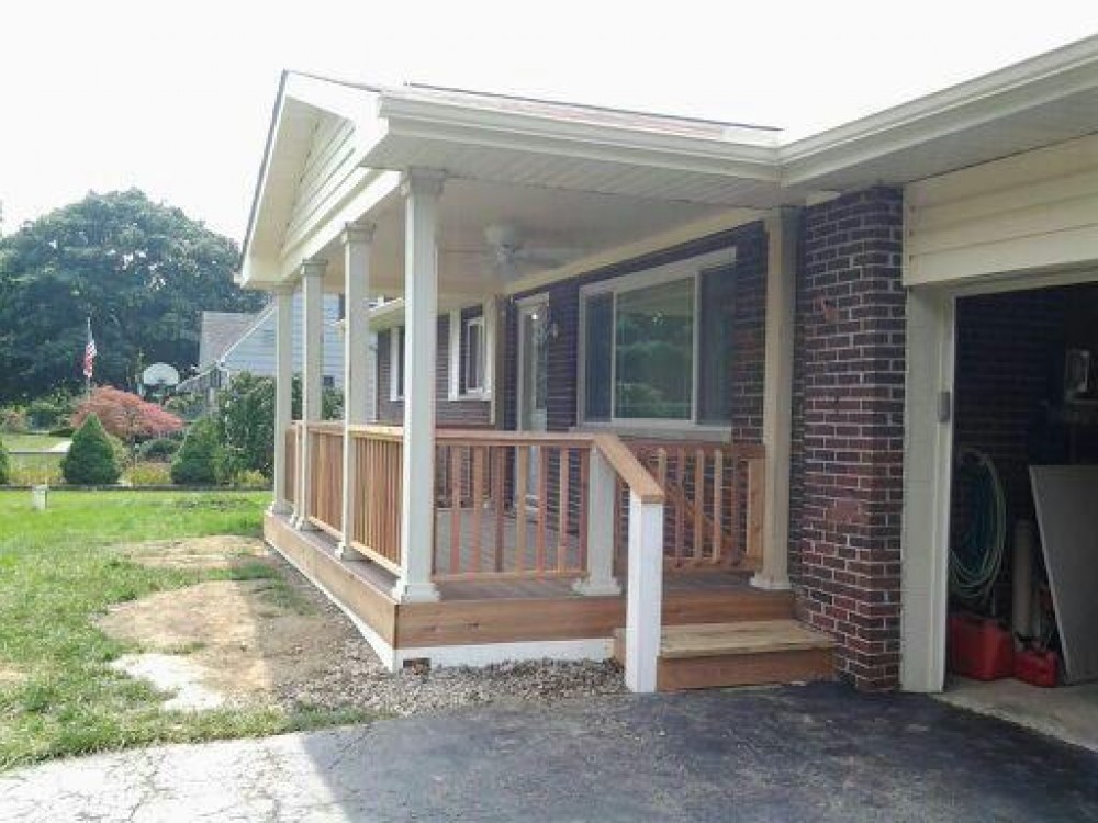 Photo By Ohio Exteriors. Covered Porch With Self-Closing Gates