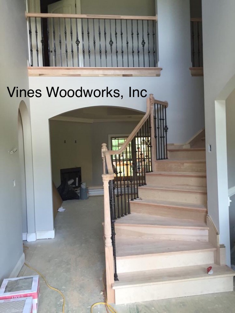 Photo By Vines Woodworks, Inc.. Custom Stairs