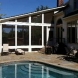 Photo by American Exteriors & Masonry. Screened Room, Patio, and Fireplace in Paeonian Springs, VA - thumbnail