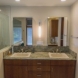 Photo by Danilo Nesovic, Designer Builder. Wood & Stone Modern Master Bath - thumbnail