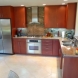 Photo by Danilo Nesovic, Designer Builder. Kitchen & Family Room - thumbnail