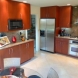 Photo by Danilo Nesovic, Designer Builder. Kitchen & Family Room - thumbnail