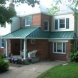 Photo by Starcom Design Build. Porches, Patios, Porticos - thumbnail