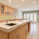 Photo by Reborn Cabinets, Inc.. Modern Kitchen Remodel - thumbnail