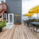 Photo by Boardwalk Builders. Bed & Breakfast Back Porch - thumbnail