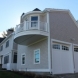 Photo by Care Free Homes Inc.. Maibec Cedar Siding, CertainTeed Designer Roofing, AZEK Decking in Marion, MA - thumbnail