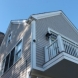 Photo by Care Free Homes Inc.. Maibec Cedar Siding, CertainTeed Designer Roofing, AZEK Decking in Marion, MA - thumbnail