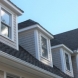 Photo by Care Free Homes Inc.. Maibec Cedar Siding, CertainTeed Designer Roofing, AZEK Decking in Marion, MA - thumbnail